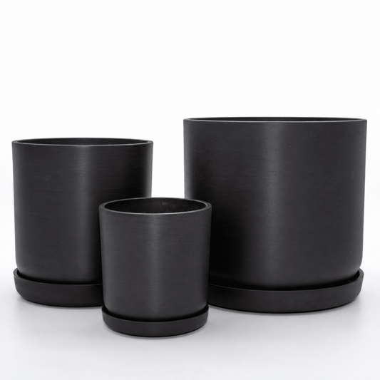 Coordinated Portland large set of three statement recycled plastic plant pots with matching saucers on a clean white background, available in Australia. Black shown.