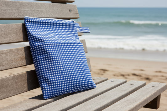 Tyoub Waterproof Stay-dry Zip Wet Bag– Blue White Gingham Check Measures 30 x 40 cm. Large front zipped pocket to separate items. Main pouch with zipper to keep wet and dry things separate. Each pocket is waterproofed and zipped. Lightweight and easy to pack and carry.Come with a handy strap for easy carrying or hooking to your nappy bag or stroller.