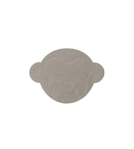 coaster in monkey shape on a white background