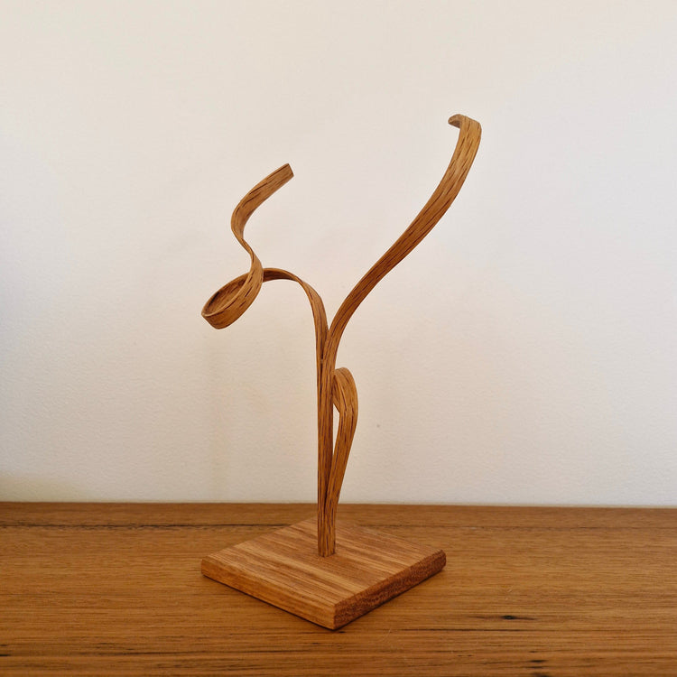 Other side view of handcrafted Upcycled Wood Design American Oak sculpture.