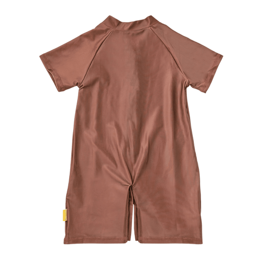Back view of the kids short sleeve swim sunsuit showcasing complete torso coverage and durable flatlock seams.