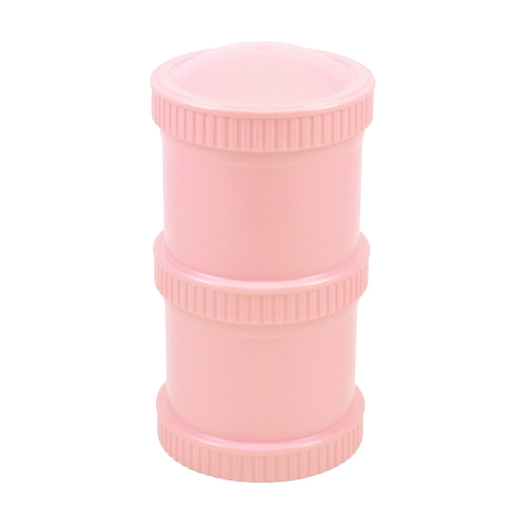 Ice pinkRe-Play Snack Stack set showing a fully assembled pair of airtight, stackable travel food pods for kids' daycare snacks.