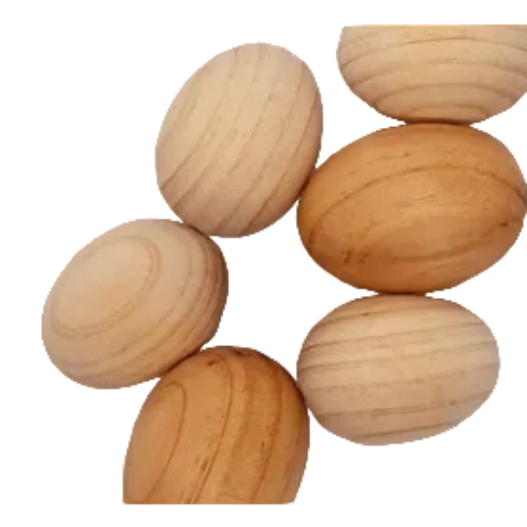 A selection of eco-friendly decorative wooden eggs made from 100% recycled timber.