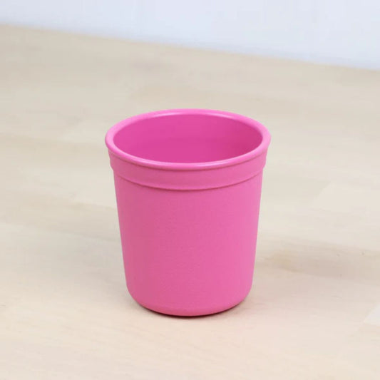 Single Re Play recycled plastic tiny tumbler open cup base with a textured grip surface on a clean white background, available in Australia in bright pink.