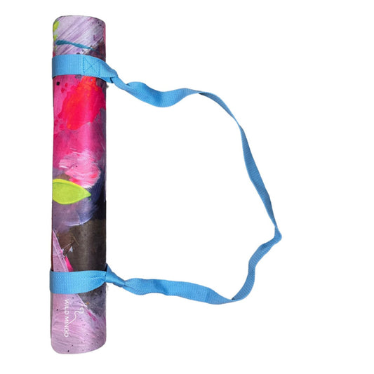 Wild Mingo printed yoga mat rolled up neatly, showing the included signature adjustable fabric carry strap.