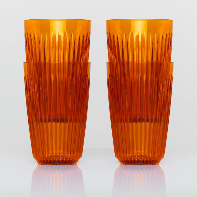 Large 12oz HuskeeRenew translucent reusable coffee cup featuring the signature vertical ribbed design made from high-performance recycled polymer in amber 4 pack.