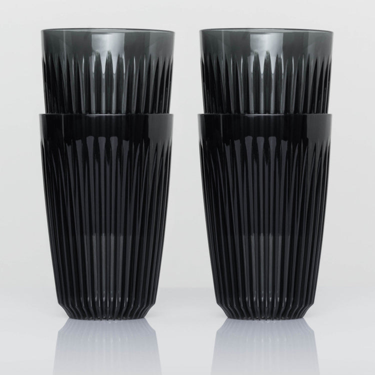 Large 12oz HuskeeRenew translucent reusable coffee cup featuring the signature vertical ribbed design made from high-performance recycled polymer in smoke 4 pack.