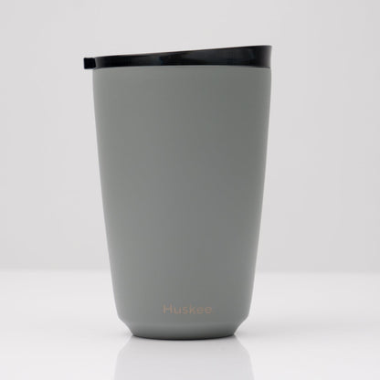 Large 12oz HuskeeSteel reusable coffee cup with matching stopper lid made from 91% recycled vacuum insulated stainless steel in slate.