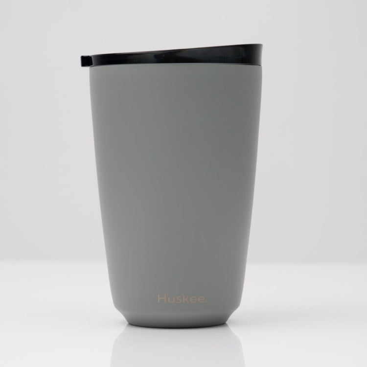 Large 12oz HuskeeSteel reusable coffee cup with matching stopper lid made from 91% recycled vacuum insulated stainless steel in slate.