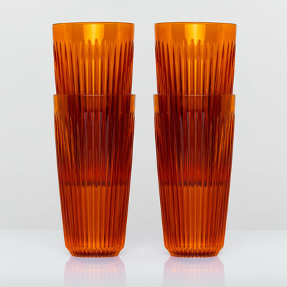 Extra large 16oz HuskeeRenew translucent reusable coffee cup featuring the signature vertical ribbed design made from high-performance recycled polymer in amber 4 pack.