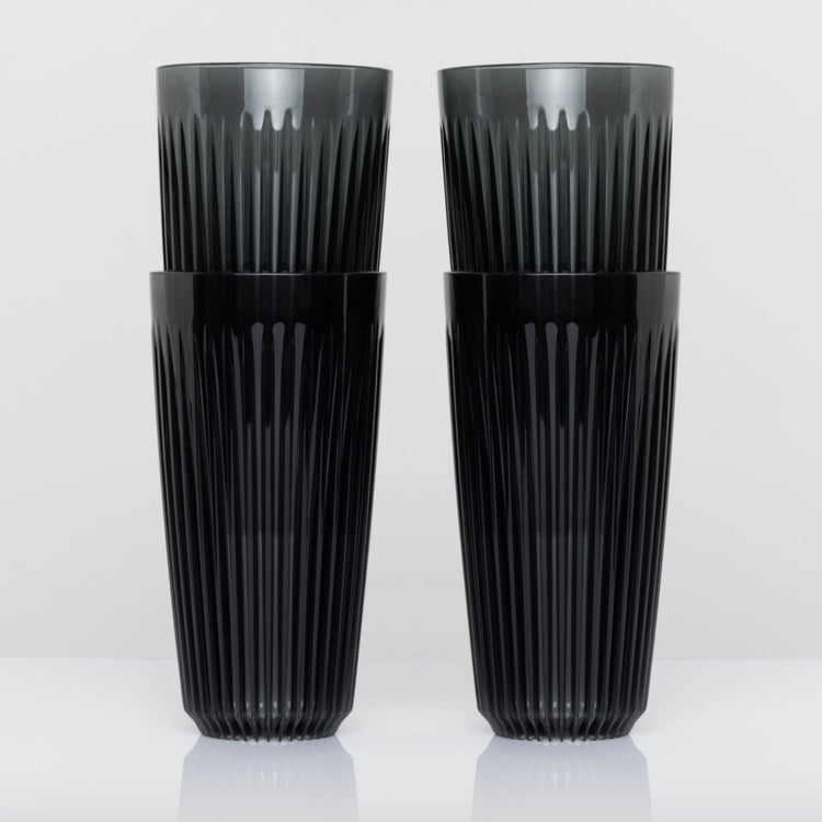 Extra large 16oz HuskeeRenew translucent reusable coffee cup featuring the signature vertical ribbed design made from high-performance recycled polymer in smoke 4 pack.