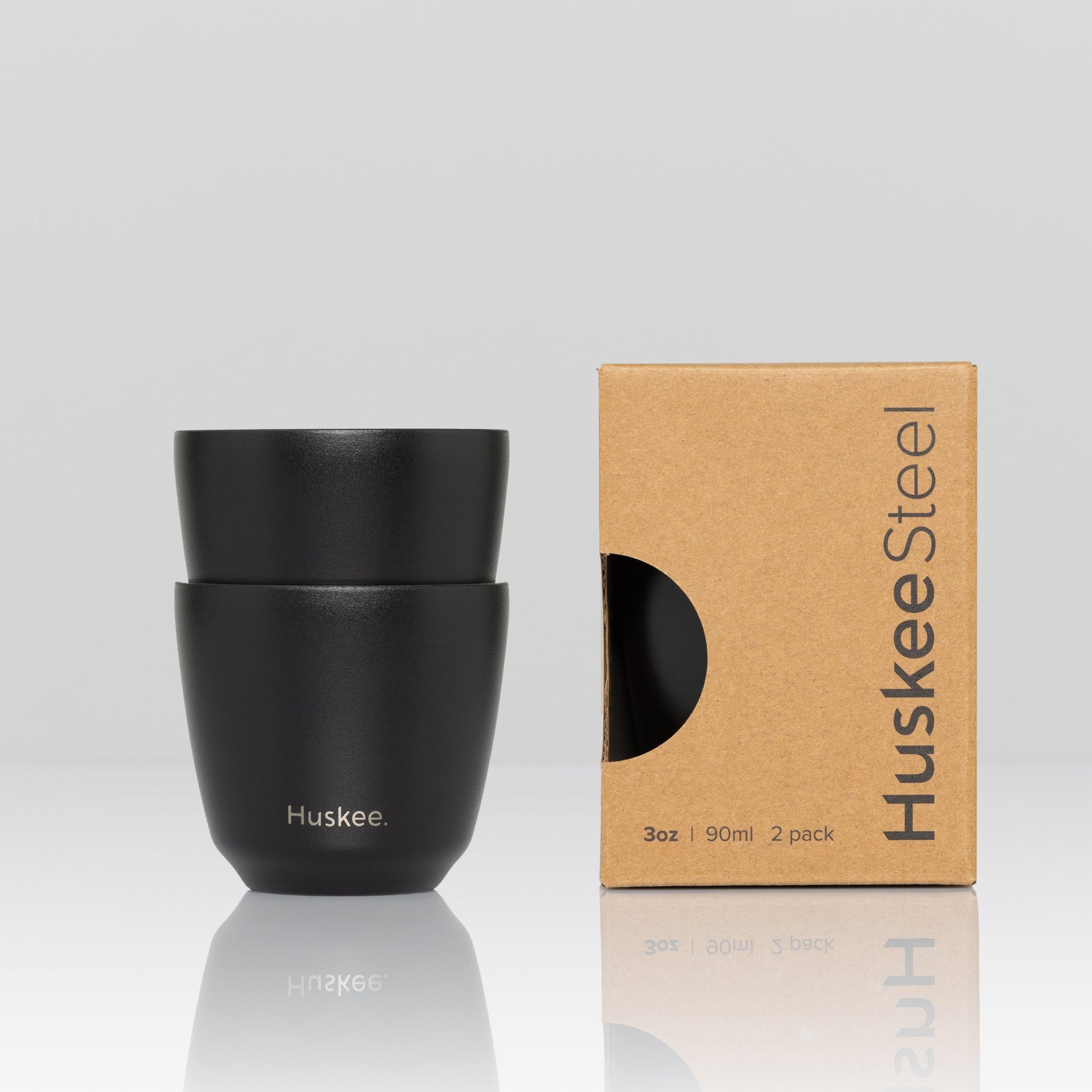 Set of 2 HuskeeSteel 3oz espresso cups crafted from 91% recycled double-wall vacuum insulated stainless steel black with box.