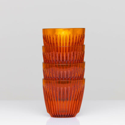 A small 6oz HuskeeRenew translucent reusable coffee cup made from high-performance recycled polymer amber 4 pack