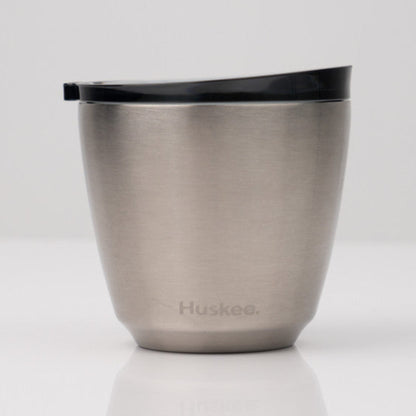 Small 6oz HuskeeSteel reusable coffee cup with matching stopper lid made from vacuum insulated stainless steel in steel.