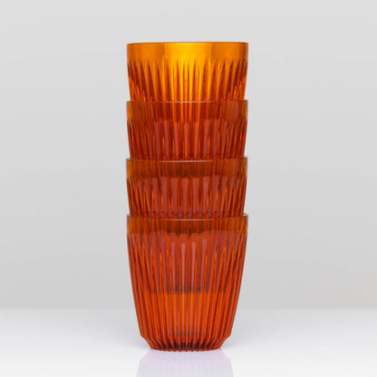 Standard 8oz HuskeeRenew translucent reusable coffee cup featuring the signature vertical ribbed design made from high-performance recycled polymer in amber 4 pack.