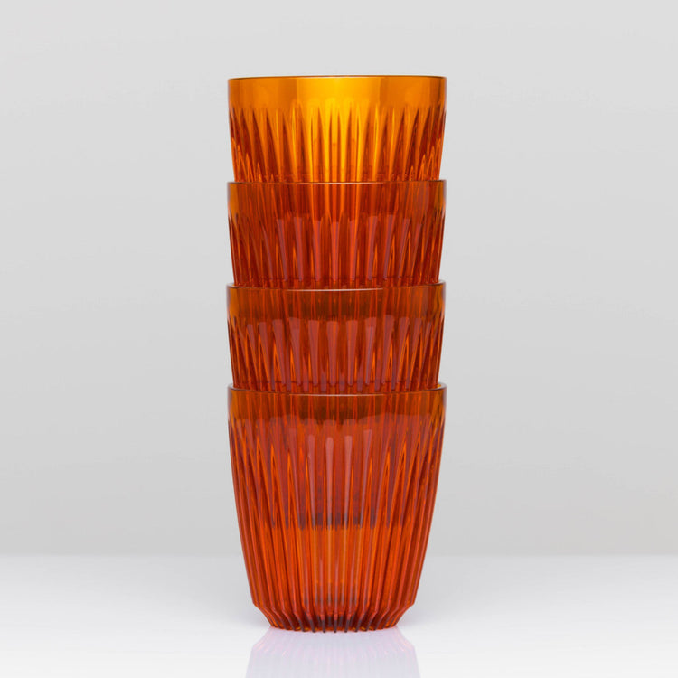 Standard 8oz HuskeeRenew translucent reusable coffee cup featuring the signature vertical ribbed design made from high-performance recycled polymer in amber 4 pack.