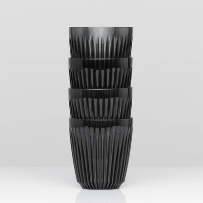 Standard 8oz HuskeeRenew translucent reusable coffee cup featuring the signature vertical ribbed design made from high-performance recycled polymer in smoke 4 pack.