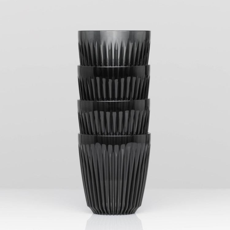Standard 8oz HuskeeRenew translucent reusable coffee cup featuring the signature vertical ribbed design made from high-performance recycled polymer in smoke 4 pack.