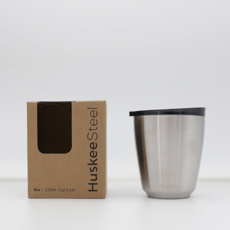 Standard 8oz HuskeeSteel reusable coffee cup with matching stopper lid made from 91% recycled vacuum insulated stainless steel in steel with box.