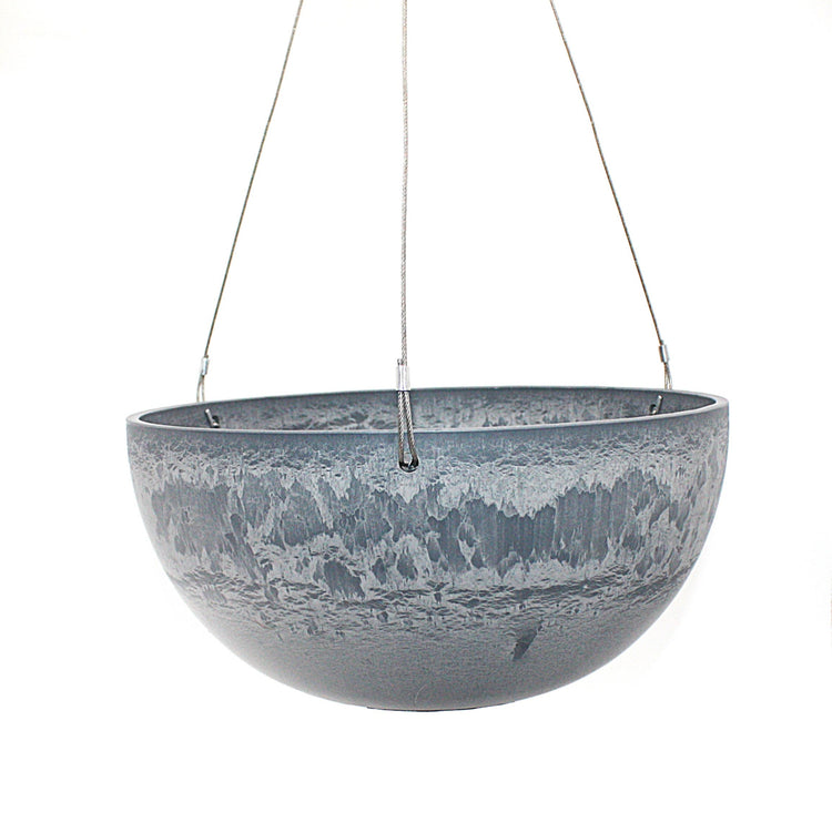 A hanging planter suspended by marine wire against a plain white background. Made from recycled plastic. Shown in Arctic Stone