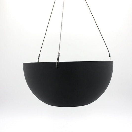 A hanging planter suspended by marine wire against a plain white background. Made from recycled plastic. Shown in Black