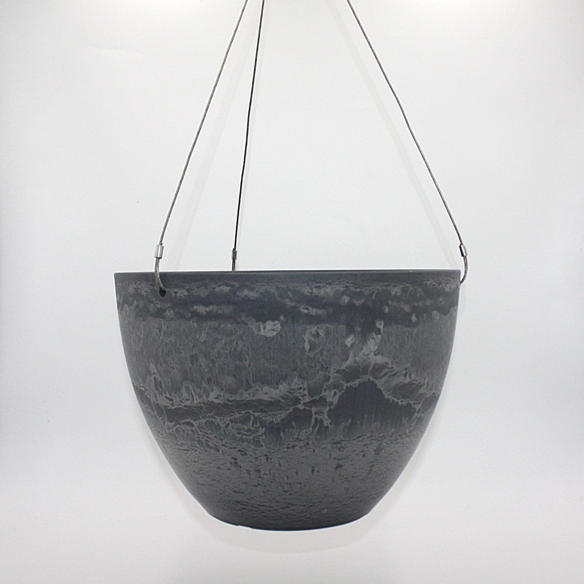 A dark gray hanging planter with a textured, marbled surface pattern, suspended by marine wire against a plain white background. Made from recycled plastic. Shown in Arctic Stone