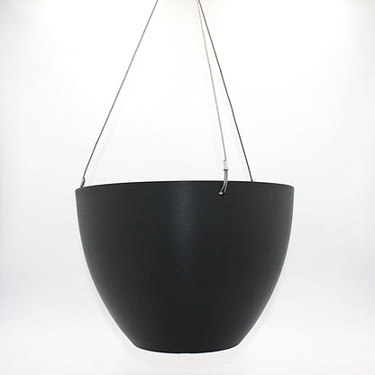 A hanging planter suspended by marine wire against a plain white background. Made from recycled plastic. Shown in Black