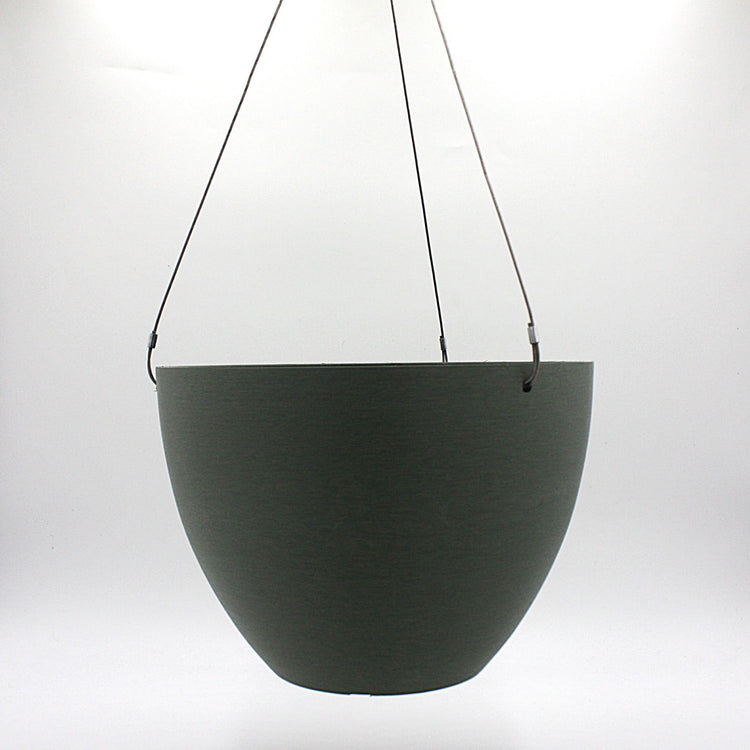 A hanging planter suspended by marine wire against a plain white background. Made from recycled plastic. Shown in Olive