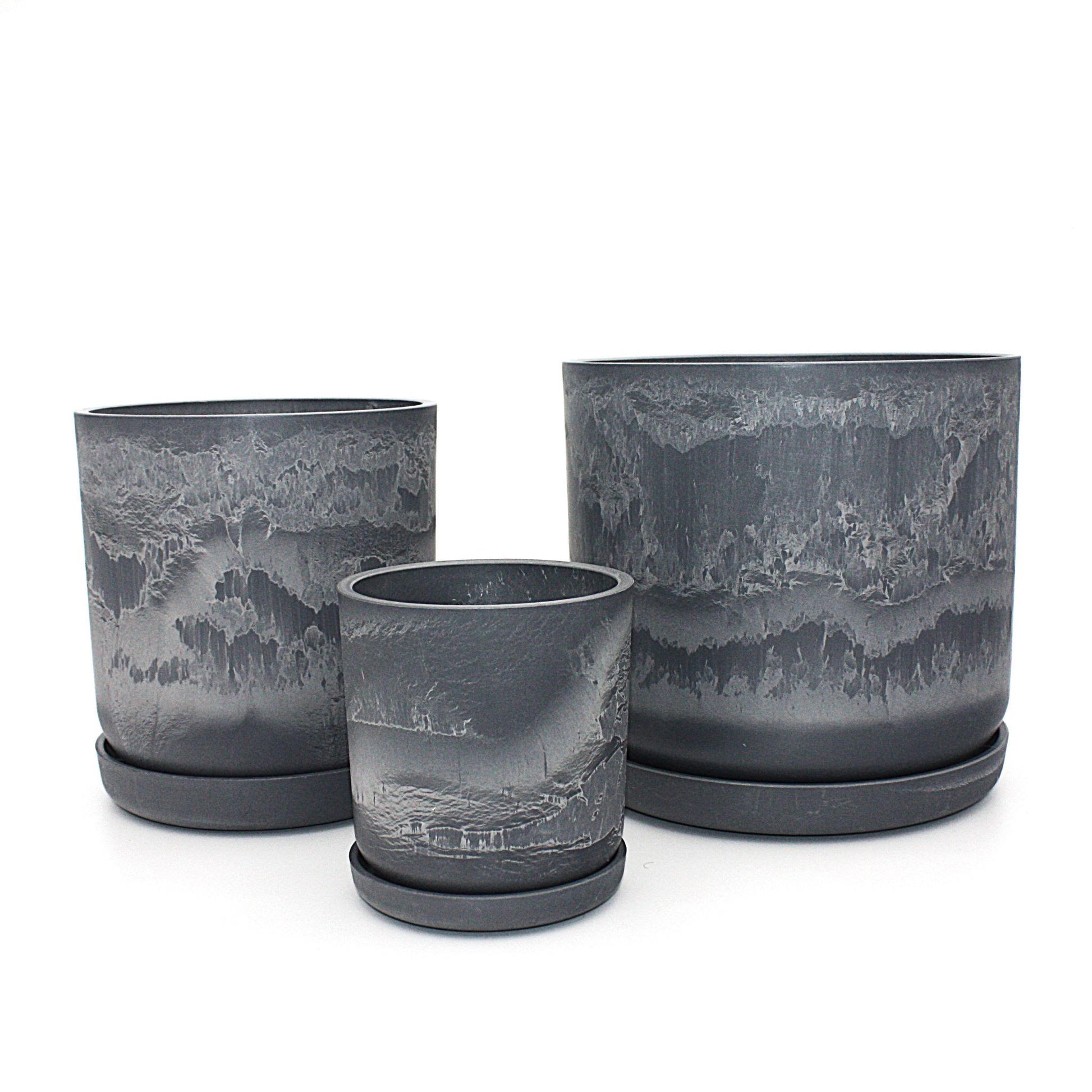 Coordinated Portland large set of three statement recycled plastic plant pots with matching saucers on a clean white background, available in Australia. Arctic Stone shown.