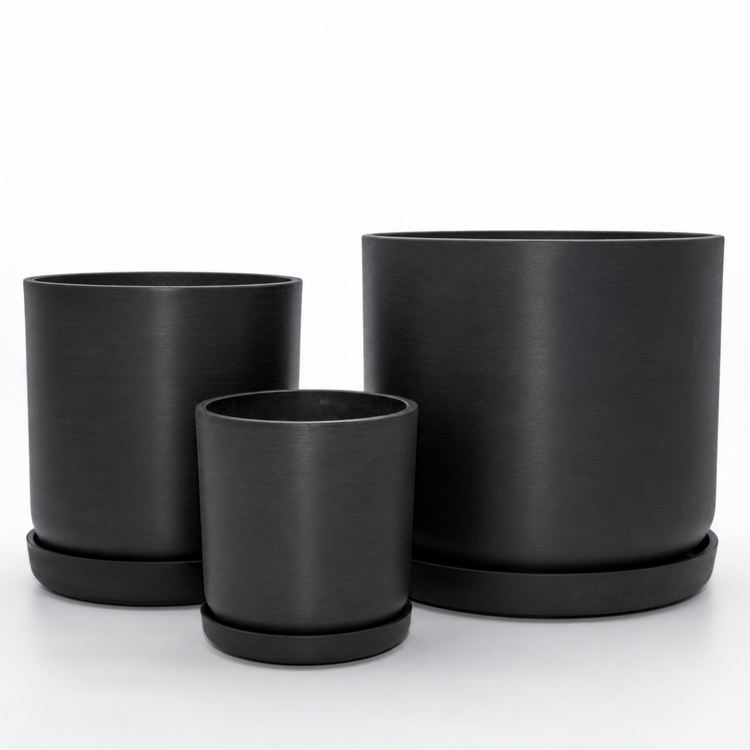 Coordinated Portland large set of three statement recycled plastic plant pots with matching saucers on a clean white background, available in Australia. Black shown.