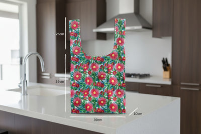Floral patterned reusable bag with measurements standing on  a kitchen bench