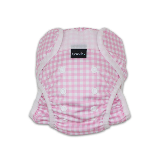 As seen on Chemist Warehouse. Tyoub Reusable and Adjustable Swim Nappy. The Reusable Swim Nappy and Wet Bag in the colour black and white Gingham Check is Excellent for swimming lessons and all aquatic play. This swim nappy fits all babies from 3 months to 3 years old. With double inner leg gusset, it is leak and accident proof. Has a Snug fit and soft elastic seams. With no gaps, the exact waistband fit with soft VELCRO tabs. Made in quick dry fabric.