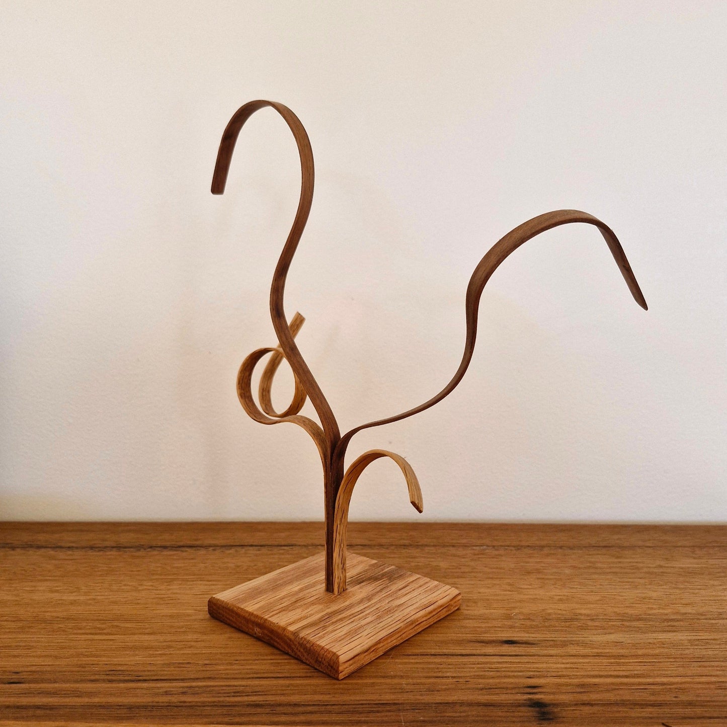 Another view of Upcycled Wood Designs organic steam-bent curves and natural wood grain.