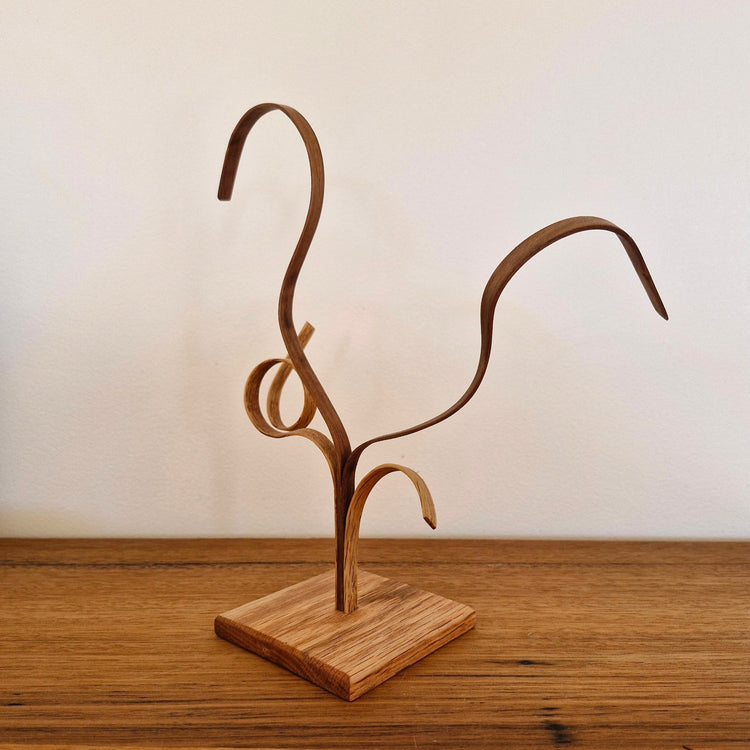 Another view of Upcycled Wood Designs organic steam-bent curves and natural wood grain.