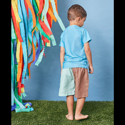 Boy modelling the Tyoub long sleeve aqua rash vest for sun smart UV protection back view.