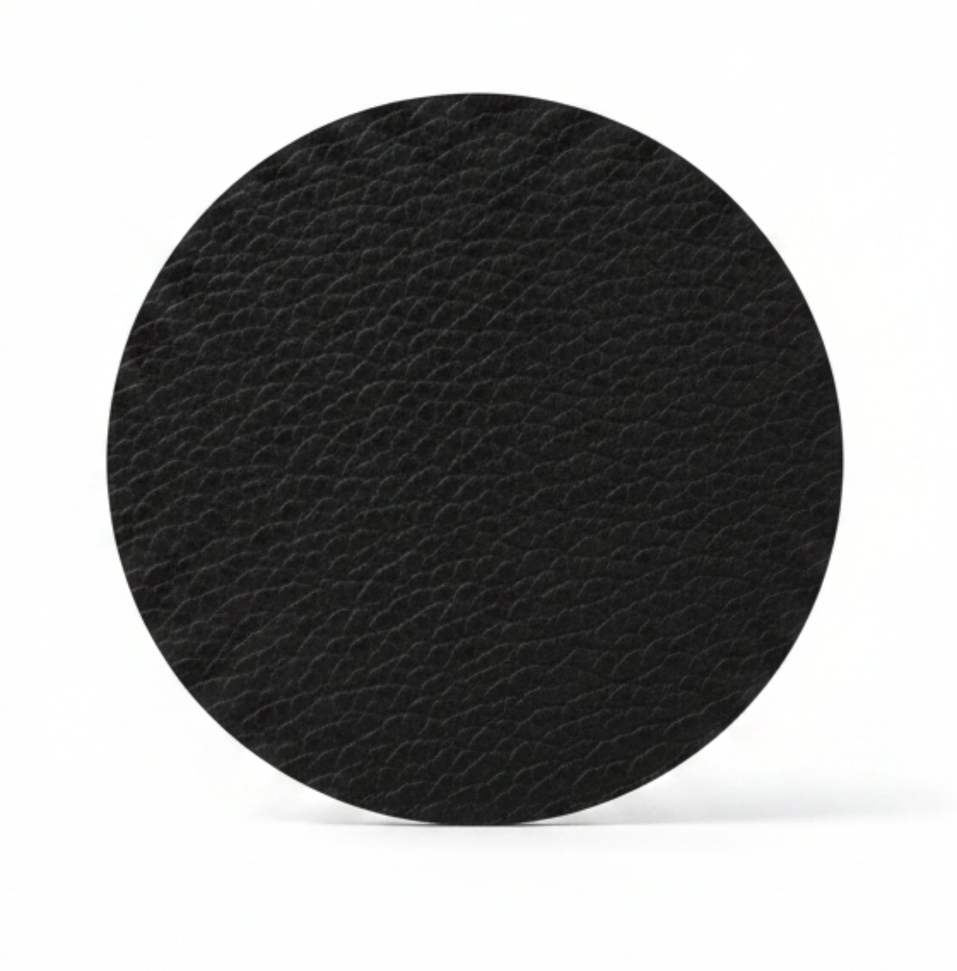 Circle recycled leather coaster featuring the signature LIND DNA buffalo texture.