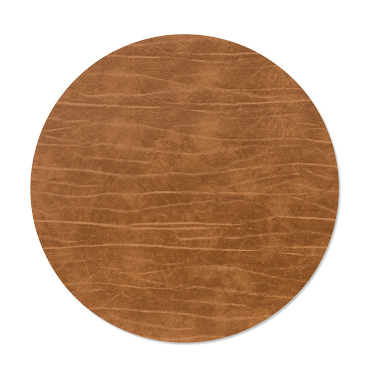 Circle recycled leather placemat featuring the signature LIND DNA Buffalo texture in nature.