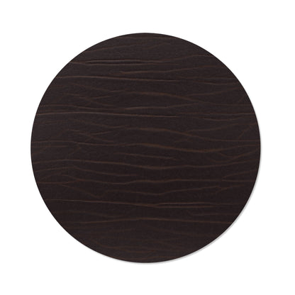 Circle recycled leather placemat featuring the signature LIND DNA Buffalo texture.