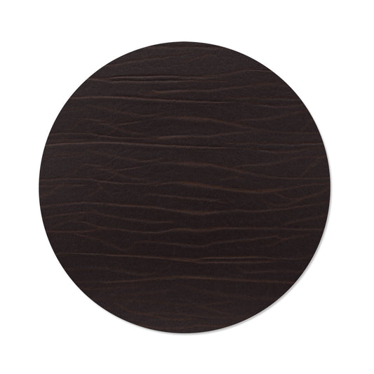 Circle recycled leather placemat featuring the signature LIND DNA Buffalo texture.
