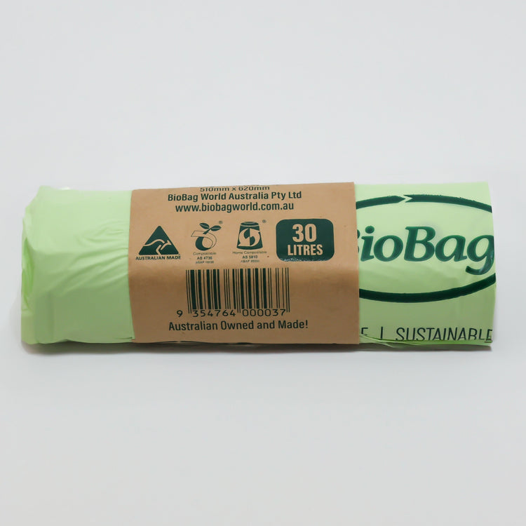Close up of Compost Mate 30 litre bio-plastic liner roll highlighting official AS5810 home compostable and AS4736 commercial compostable certifications.  