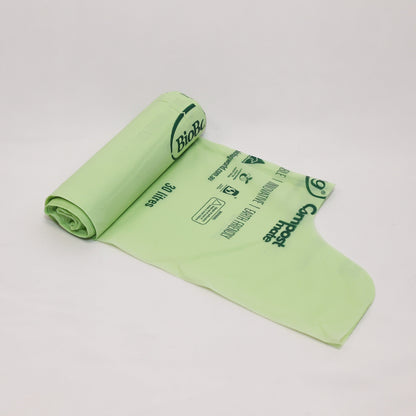 Close up of Compost Mate bio-plastic liner roll highlighting official AS5810 home compostable and AS4736 commercial compostable certifications.