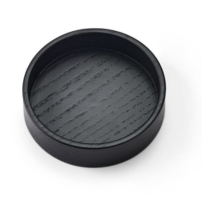 LIND DNA Circle recycled leather coaster box black top view.