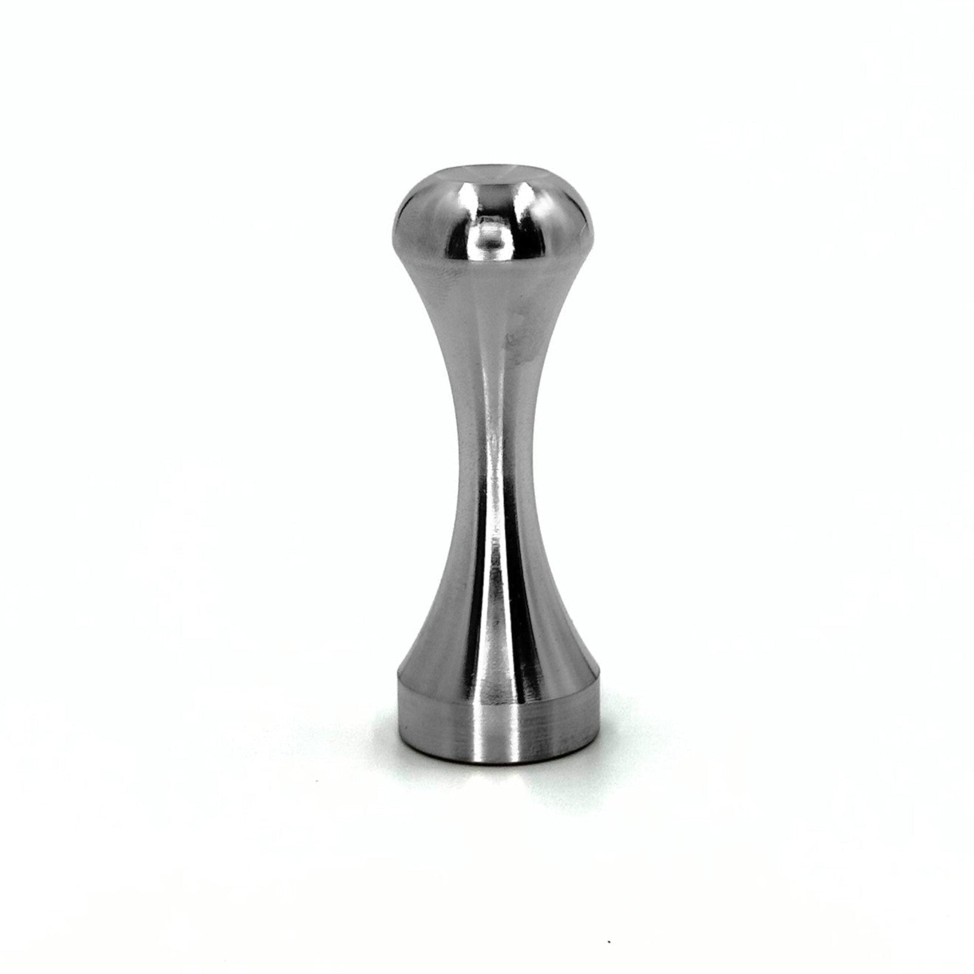 Pod Star stainless steel coffee tamper for Espressotoria or Nespresso on a white background.