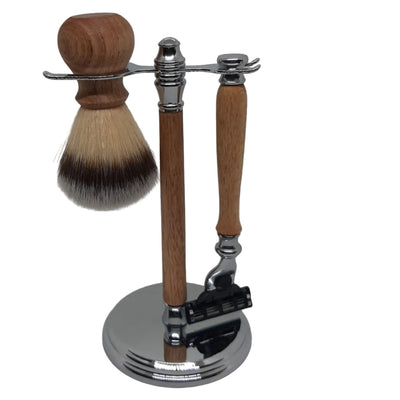 A premium 3-piece men's grooming kit featuring a hand-turned recycled timber Gillette Mach III razor and matching shave brush resting on a  wooden shaft stand, handcrafted in Australia in chrome.