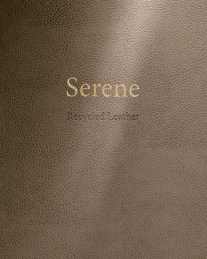 Brown leather surface with 'Serene' and 'Recycled Leather' text.