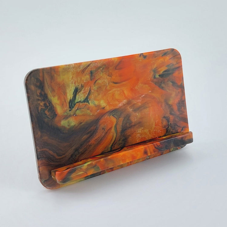 Fully assembled EcoView mobile phone stand made from marbled recycled plastic in Campfire. Eco friendly desktop phone holder in Australia.