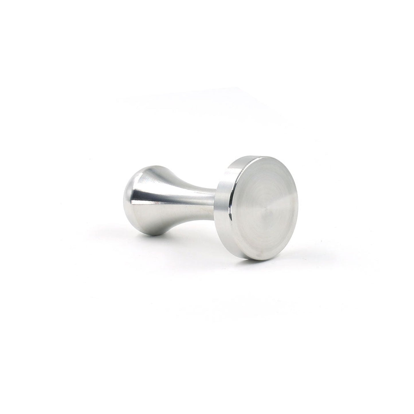 A close-up view of the Pod Star coffee pod tamper resting on its side for Caffitaly and Lavazza compatible capsule systems.