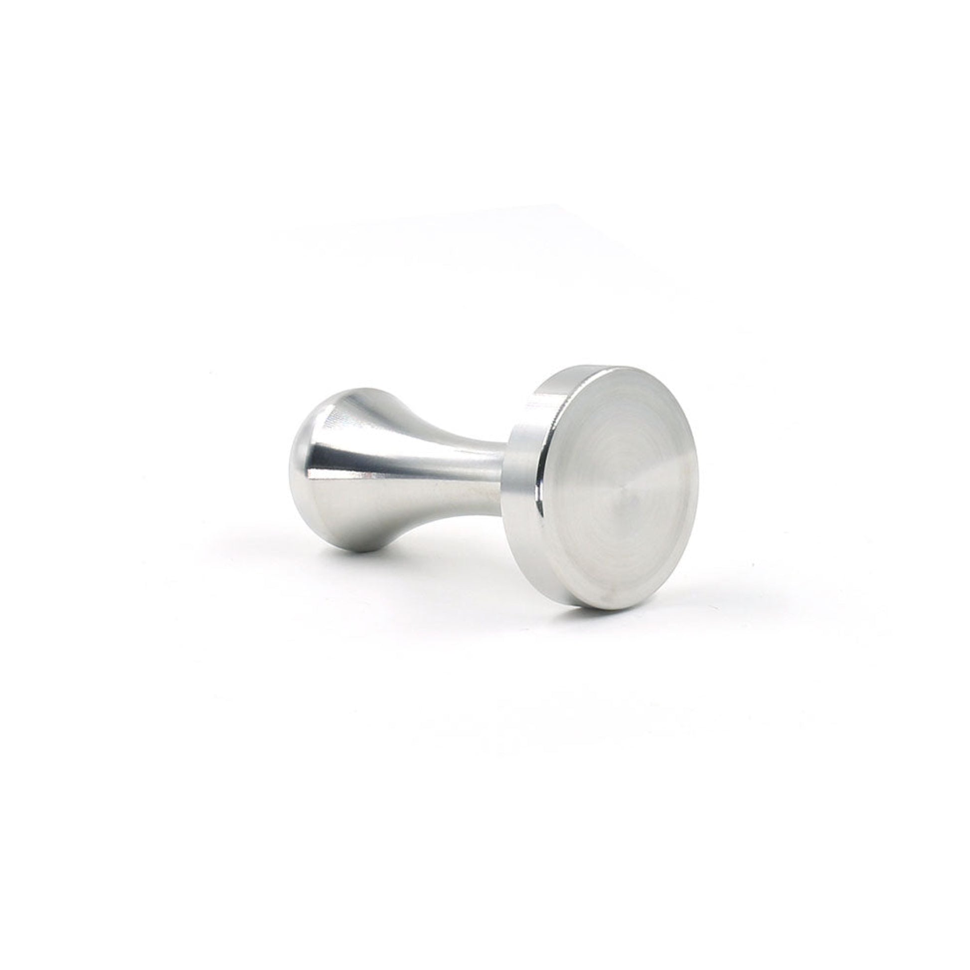 A close-up view of the Pod Star coffee pod tamper resting on its side for Caffitaly and Lavazza compatible capsule systems.