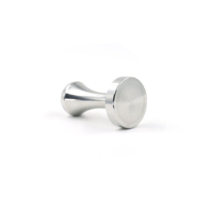 A close-up view of the Pod Star coffee pod tamper resting on its side for Caffitaly and Lavazza compatible capsule systems.