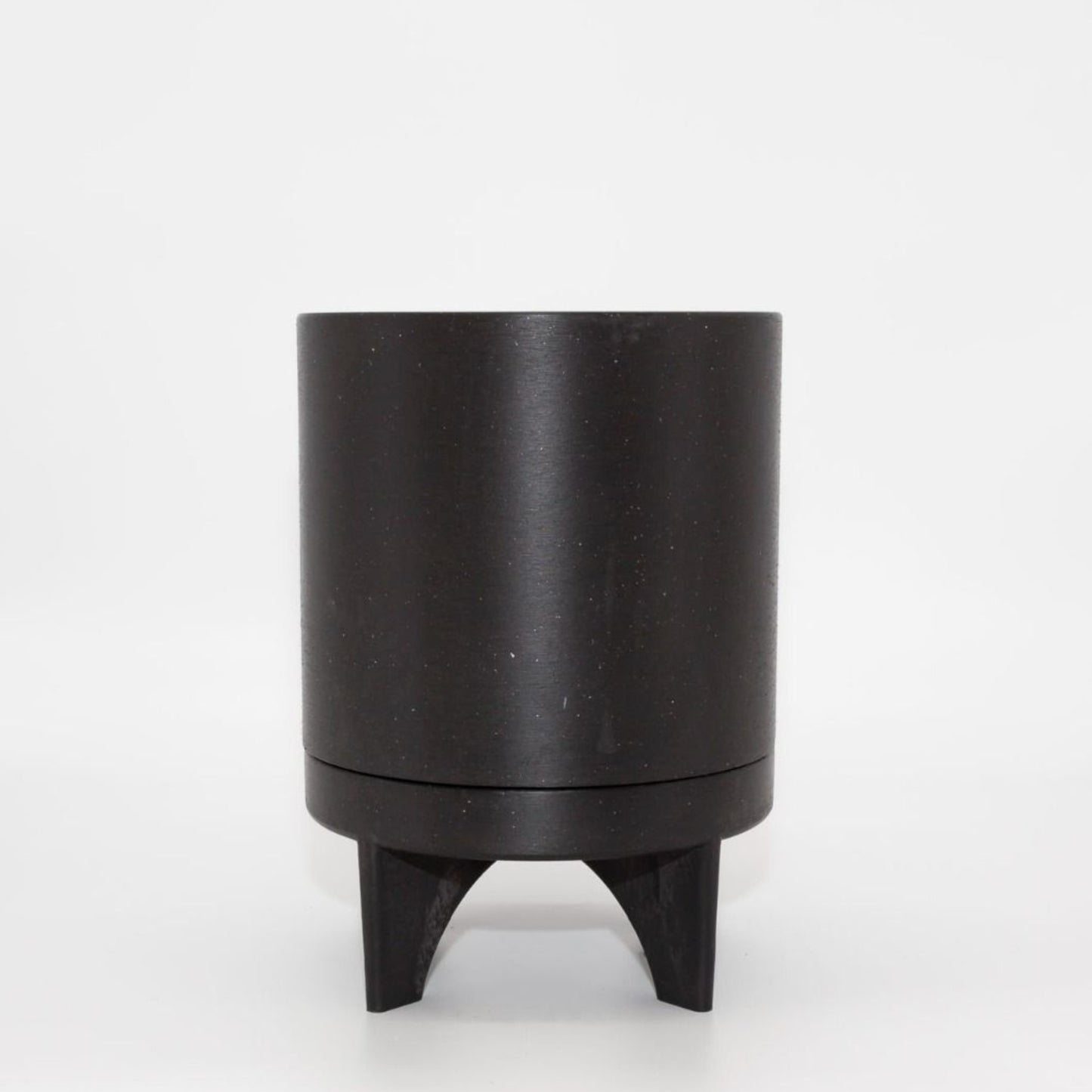 Single Florence recycled plastic plant pot with a smooth minimalist tapered silhouette on a clean white background, available in Australia. Black shown.